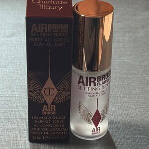 Charlotte Tilbury Airbrush Flawless Setting Spray 15ml travel size.